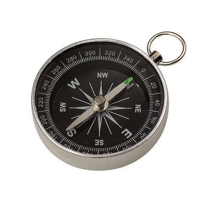 Compact aluminium compass keychain with tempered glass surface and bright compass face, perfect for outdoor adventures in the UK