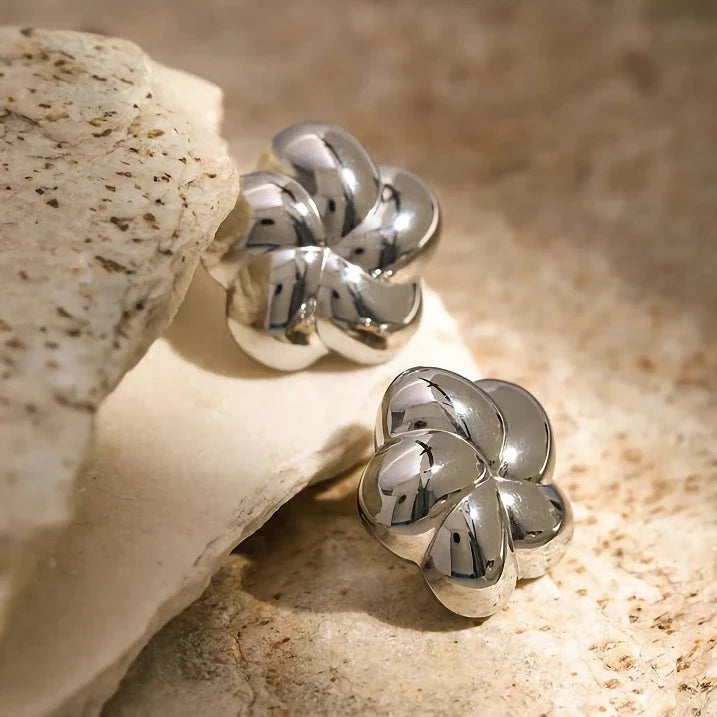 Elegant 18K gold plated flower-shaped stud earrings made from durable stainless steel