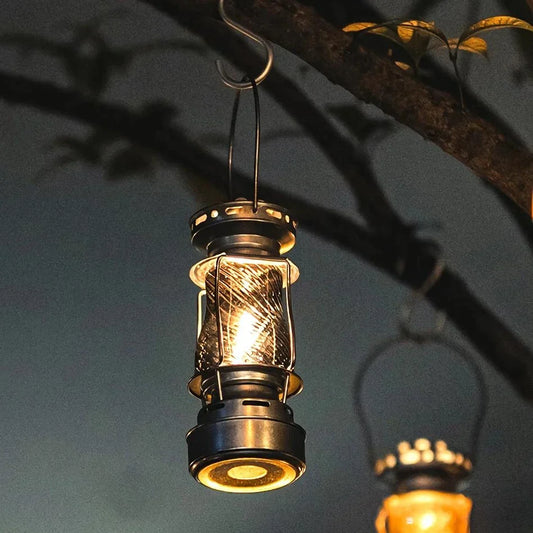 Classic vintage-inspired kerosene camping lamp with stainless steel construction and automatic ignition for reliable outdoor lighting