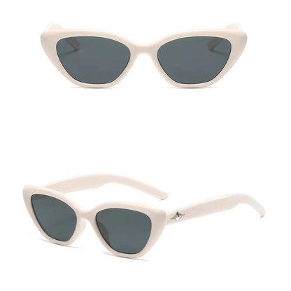 Classic cat-eye sunglasses with rice nail detail, offering UV protection and gradient lenses for a timeless, sophisticated look.