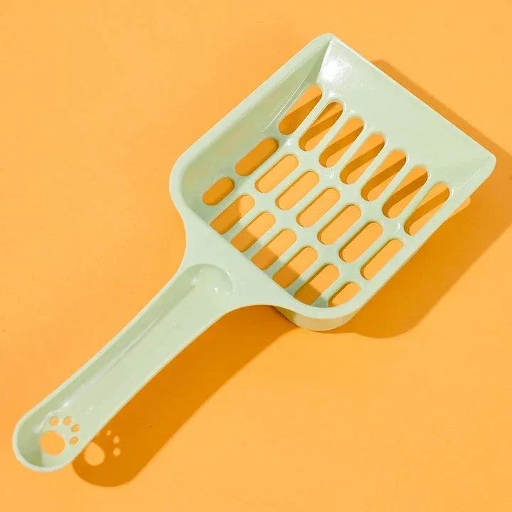 A large, high-quality cat litter scoop made of durable plastic with a hollow design for efficient cleaning.