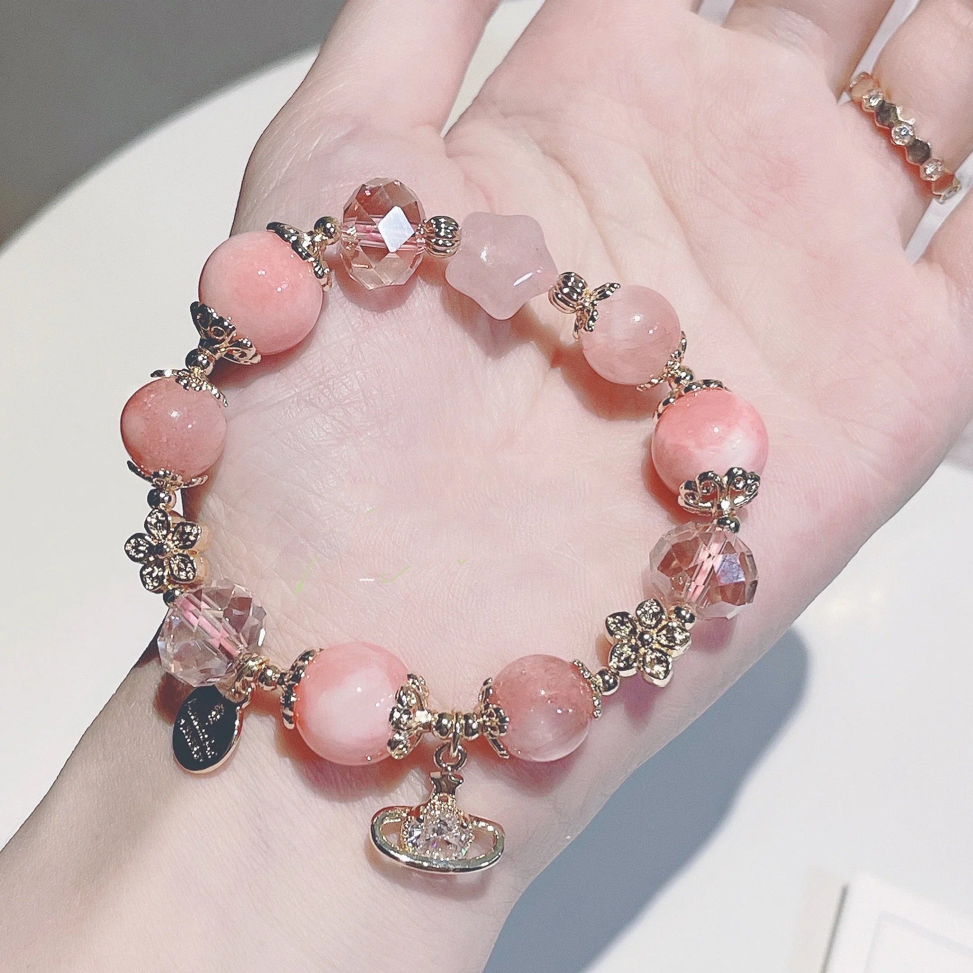 Stylish cream agate crystal bracelet with captivating Star of Peach design, available in S and M sizes for fashion-conscious British women