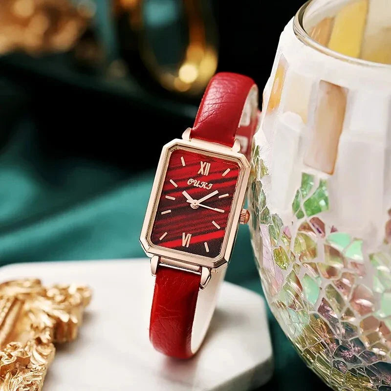 Refined square dial ladies watch with genuine leather strap, minimalist design, and durable aluminium alloy case