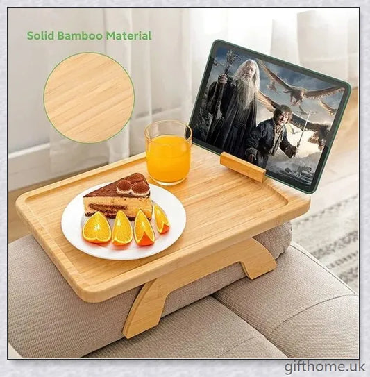 Elegant bamboo sofa tray with a natural finish, designed for relaxation and serving beverages or snacks in the living room or bedroom.
