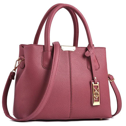A stylish one-shoulder tote bag in various colours, made of premium polyester with an adjustable strap and spacious interior for the modern professional woman.