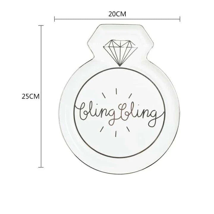 Elegant diamond ring-inspired porcelain dinnerware set with plate, bowl, and cup in a minimalist white colour