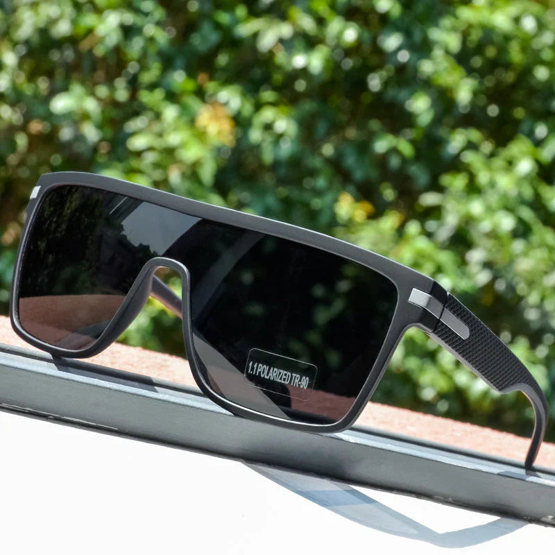 Sophisticated polarized square sunglasses with a modern and stylish design, offering enhanced visual clarity and UV protection.