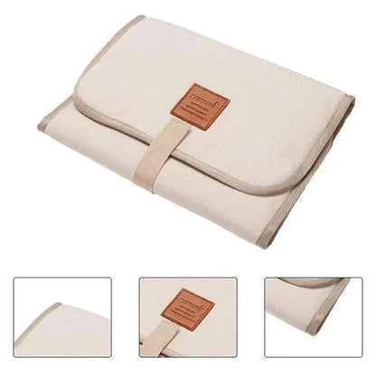 Premium waterproof changing pad for babies, featuring a compact, foldable design and soft, skin-friendly materials for a comfortable, hygienic nappy changing experience on the go.