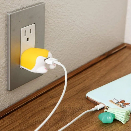 Cheeky Corgi USB Charger: A whimsical, British-inspired device that celebrates your love for corgis while keeping your tech powered up on the go.