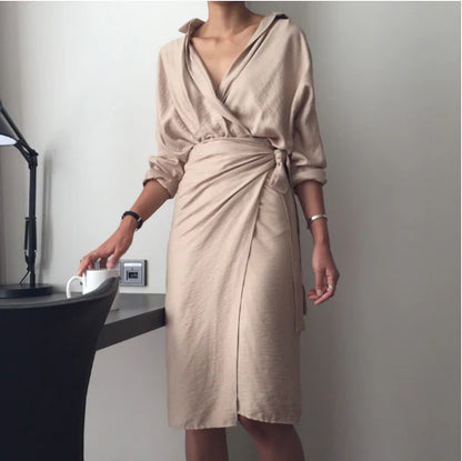 Irregular wrap dress in beige with a unique, contemporary design and premium cotton blend fabric