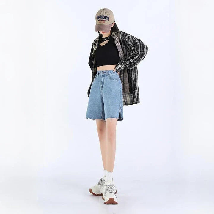 Premium high-rise wide-leg denim shorts in a classic blue colour, featuring a flattering silhouette and practical pockets