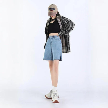 Premium high-rise wide-leg denim shorts in a classic blue colour, featuring a flattering silhouette and practical pockets