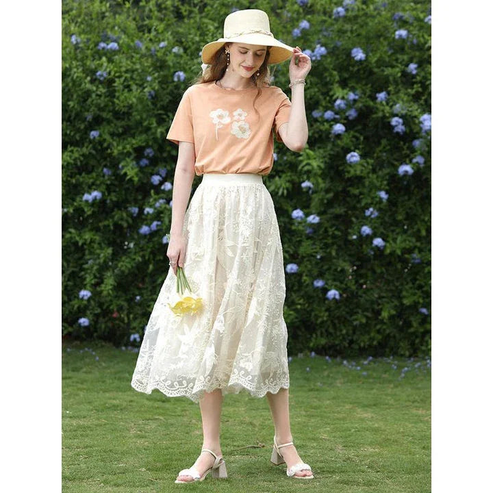 Elegant floral lace A-line skirt in apricot colour, featuring a flattering silhouette and intricate embroidery