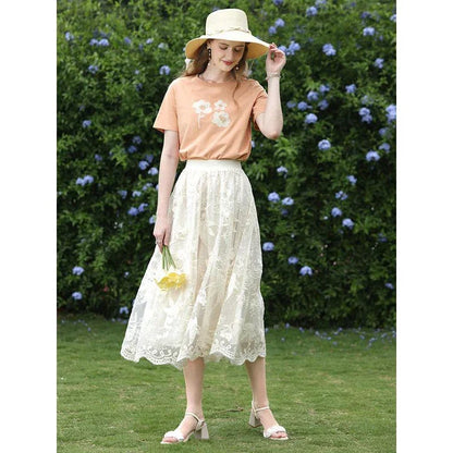 Elegant floral lace A-line skirt in apricot colour, featuring a flattering silhouette and intricate embroidery
