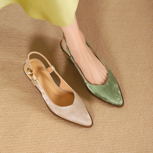Elegant slingback leather pumps with a stylish mule design, secure buckle closure, and 4cm square heel