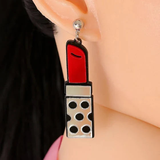 Trendha Red Lipstick Earrings: Striking resin earrings in a bold lipstick design, perfect for adding a touch of modern flair to any outfit.