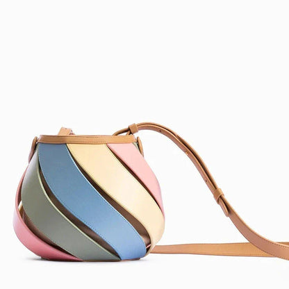 Stylish striped PU leather bucket handbag with versatile carry options and roomy interior