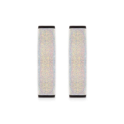 Multicoloured bling seat belt covers in a car, adding a touch of glamour and personality to the interior