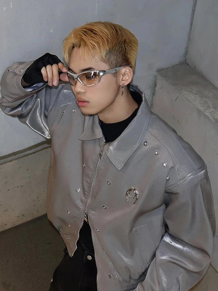 A stylish padded shoulder jacket in black and silver grey, featuring a structured silhouette and a comfortable, wrinkle-resistant design.