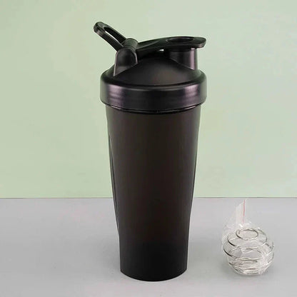 Premium protein shaker bottle with stainless steel whisk ball, BPA-free plastic, and leak-proof design for on-the-go fitness enthusiasts in the UK.