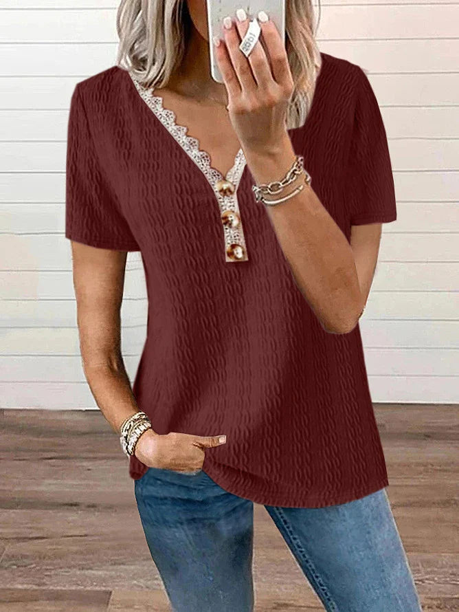 Stylish loose-fit V-neck casual T-shirt with lace detailing and button accents, available in a range of colours