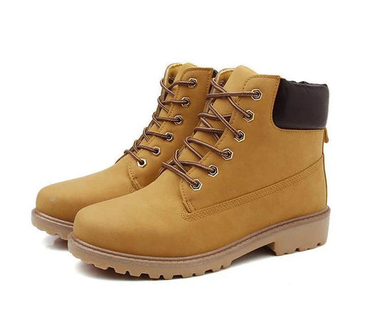 Durable lace-up ankle boots in yellow, featuring a robust rubber sole and faux leather construction for all-weather versatility.