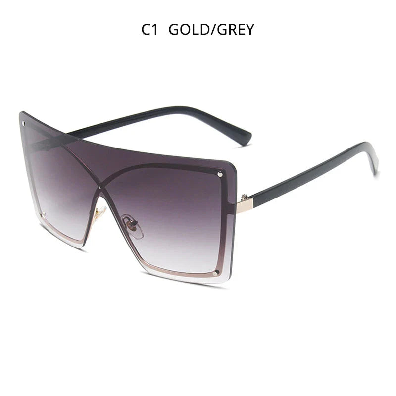 Fashionable oversized flat top sunglasses with gradient lenses and a sleek, rimless plastic frame