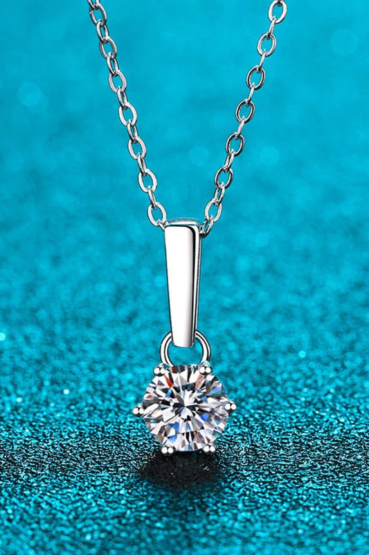 Elegant 1 carat moissanite and sterling silver necklace with a polished, modern design