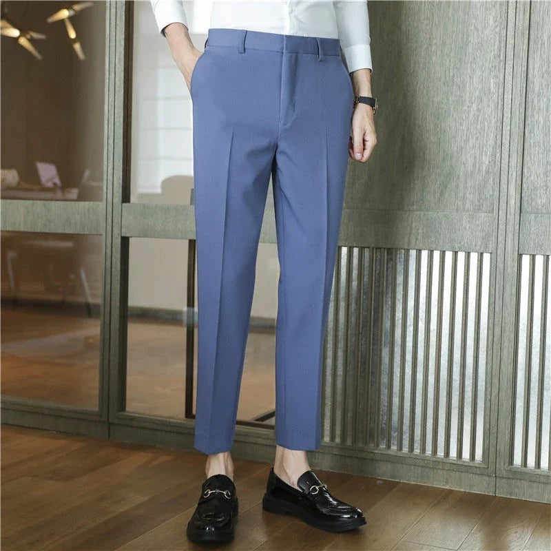 Premium men's suit trousers in a variety of colours, featuring a subtle textured drape and exceptional stretch for all-day comfort and style.