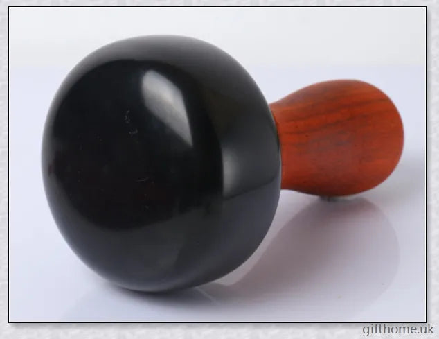 Premium mahogany Bian stone warming moxibustion device with red rosewood accents, designed for traditional Chinese healing practices.