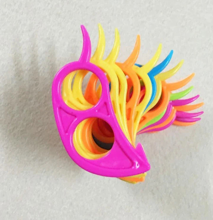 Colourful citrus peeler with a playful, mouse-shaped design made of durable plastic