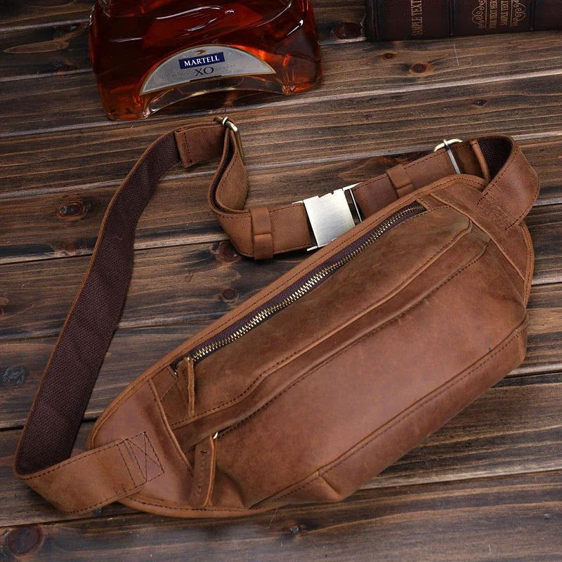 Premium British leather crossbody bag with adjustable strap and multiple pockets for organised storage