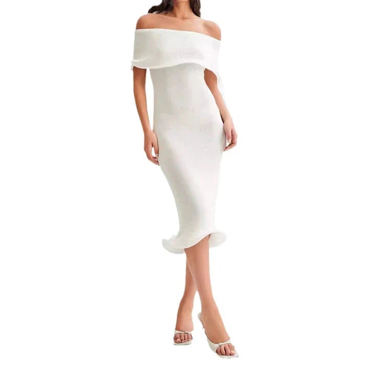 Chic white sleeveless dress with slim-fit silhouette, perfect for stylish occasions in the UK