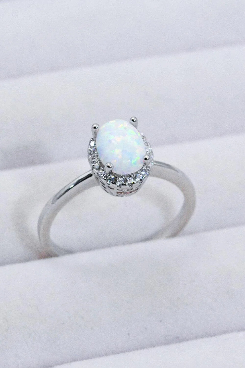 Premium 925 sterling silver ring featuring a captivating Australian opal gemstone, showcasing the enduring craftsmanship of British jewellery design.