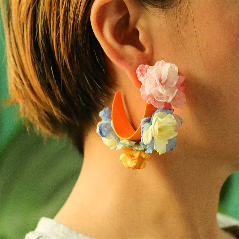 Exquisite handcrafted floral earrings with delicate fabric flowers and alloy accents, showcasing timeless British elegance