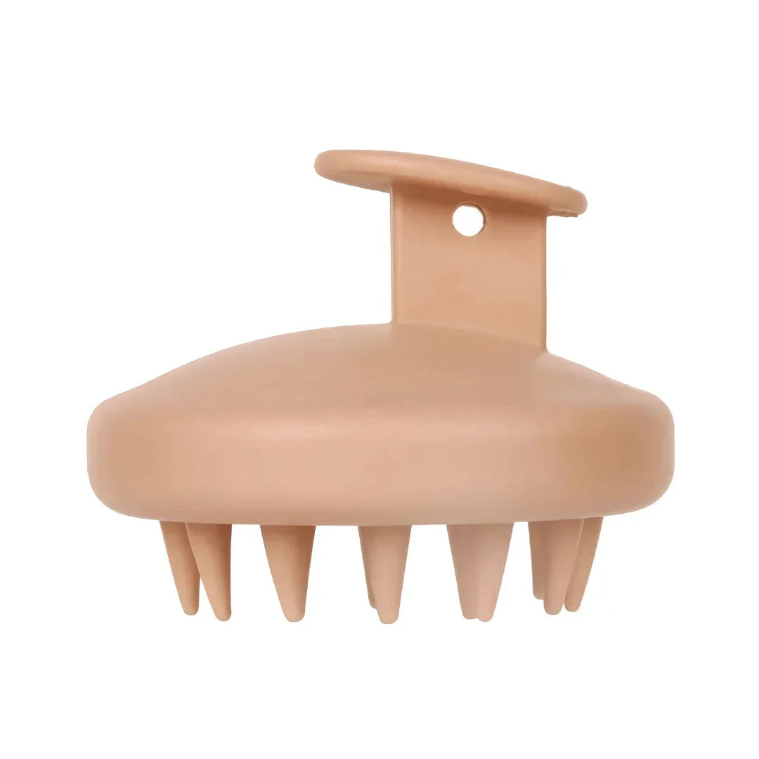 A green silicone scalp massager with soft bristles, designed to provide a soothing hair washing experience and promote healthy hair growth.