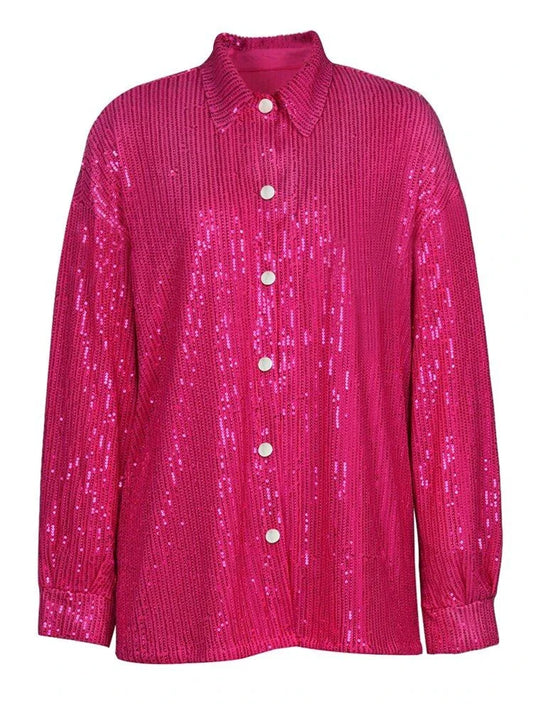 Elegant woman wearing a luxurious sequin top and pants set, perfect for a glamorous evening event
