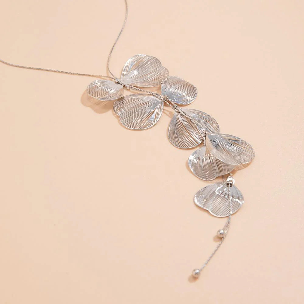 Elegant Kpop-inspired flower petal choker necklace in radiant gold colour, featuring a beautiful pendant and chic snake chain design