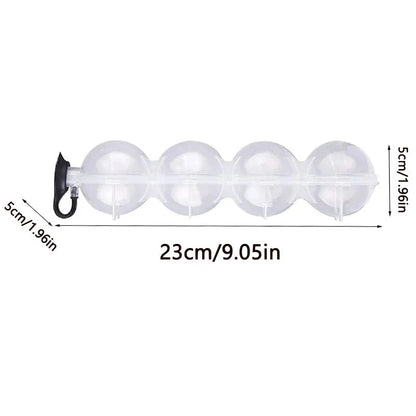 Exceptional 4-hole ice ball mould made from premium food-grade silicone and plastic for creating perfectly chilled drinks