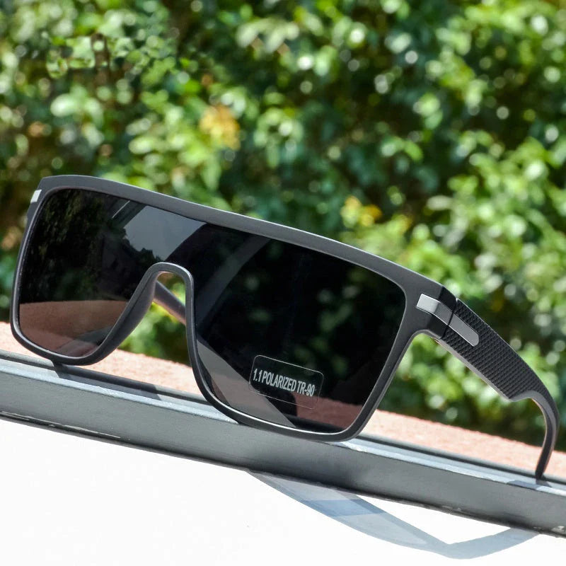 Sophisticated polarized square sunglasses with a modern and stylish design, offering enhanced visual clarity and UV protection.