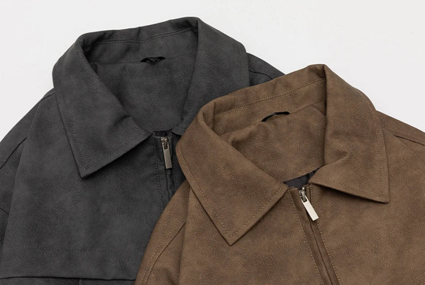 A classic distressed leather jacket in a relaxed, unstructured fit suitable for both men and women