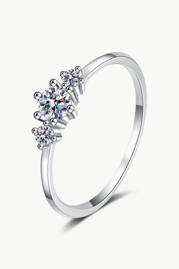Dazzling sterling silver ring featuring a sparkling moissanite centre stone, perfect for date nights and special occasions.