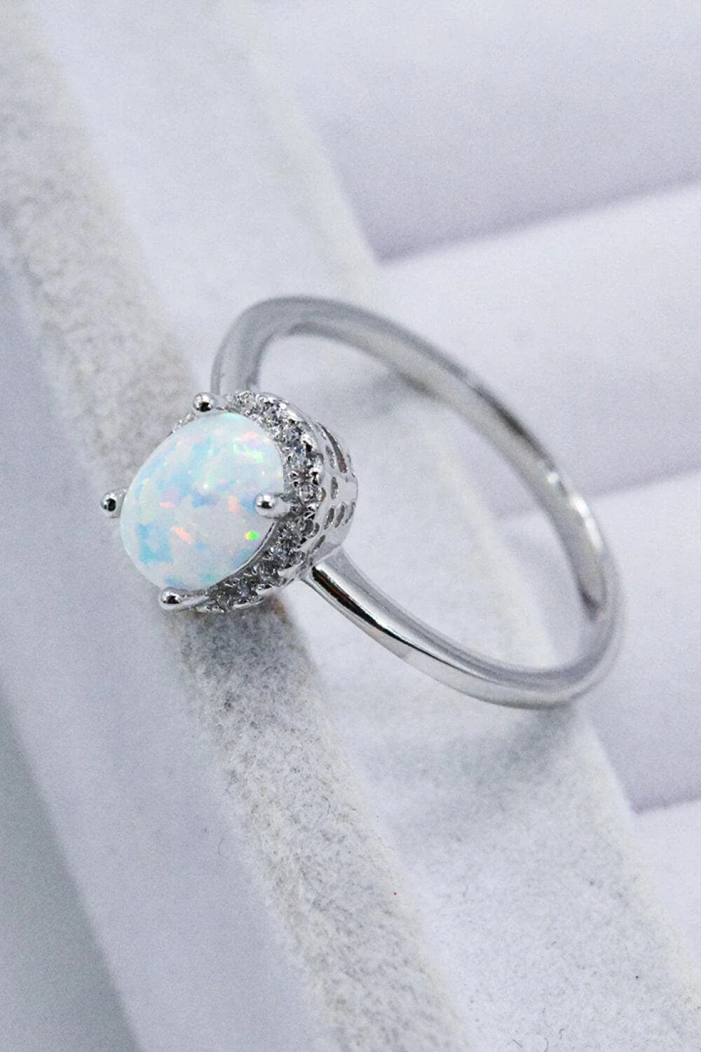 Premium 925 sterling silver ring featuring a captivating Australian opal gemstone, showcasing the enduring craftsmanship of British jewellery design.