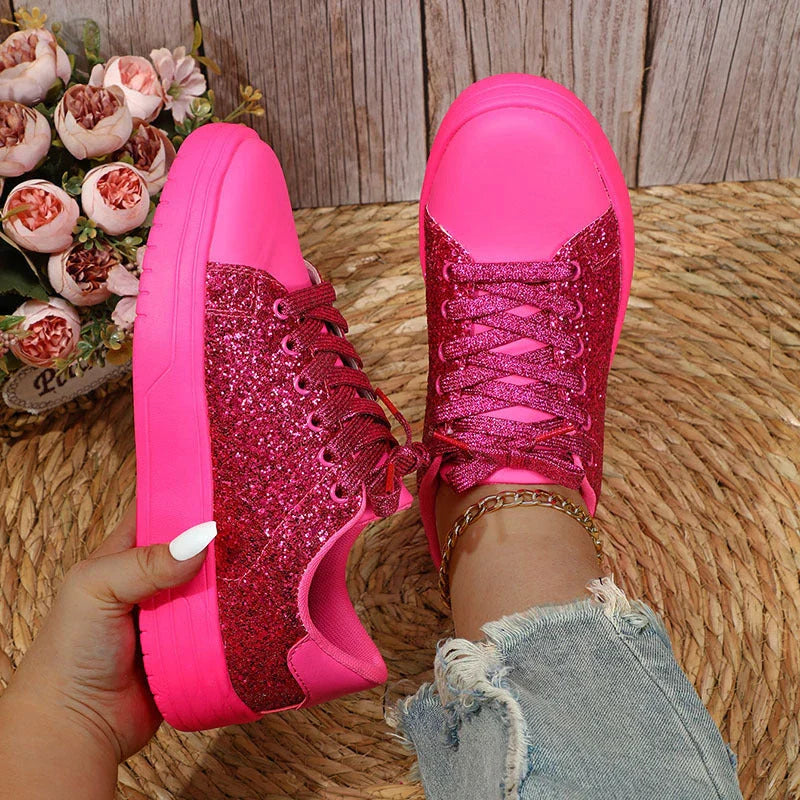 Glittering sequin flats with thick soles and lace-up closure in various vibrant colours