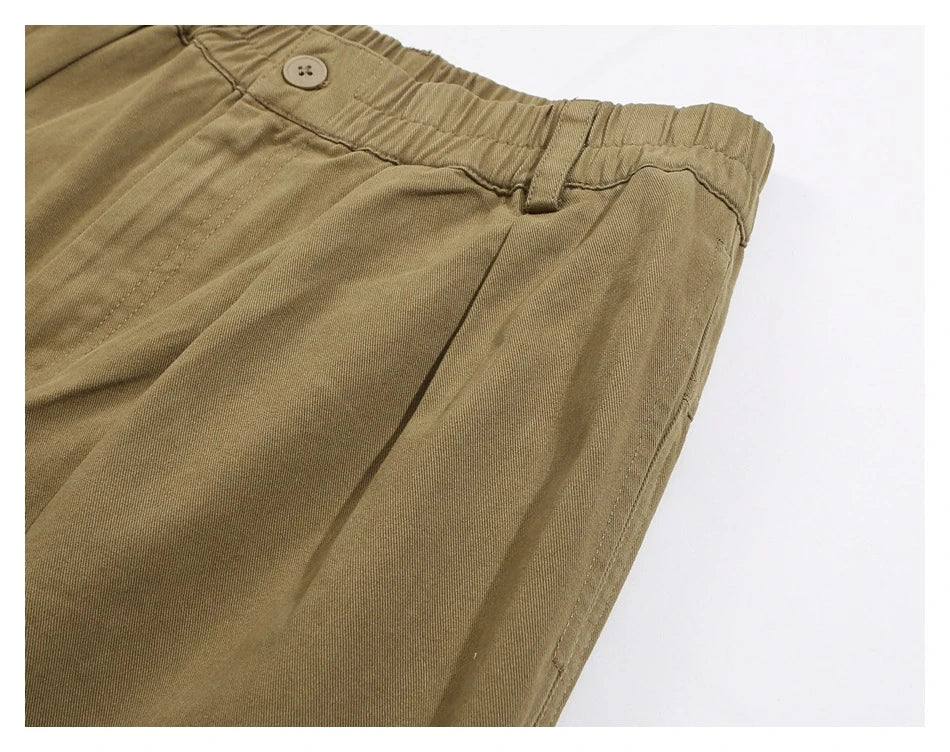 Sophisticated men's casual trousers in various colours, featuring a tailored straight-leg design and mid-rise waistline for a polished, British-inspired look.