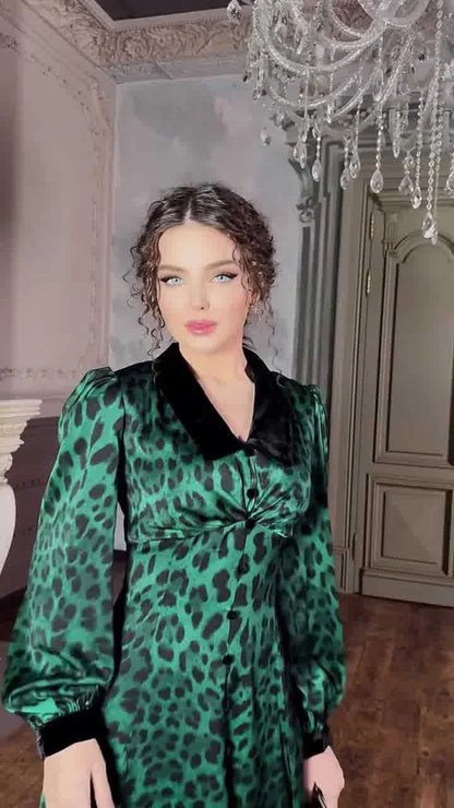 A stylish leopard print dress with a waist-trimming design, perfect for adding a touch of feline fierceness to your wardrobe.