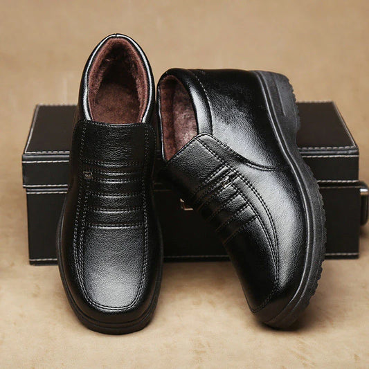 Premium cotton leather men's ankle boots in black and brown, featuring plush lining and durable rubber sole for warmth and stability in cold weather