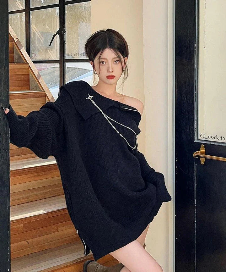 Luxurious off-the-shoulder zipper sweater in black and beige, featuring lantern sleeves and a cozy alpaca wool blend