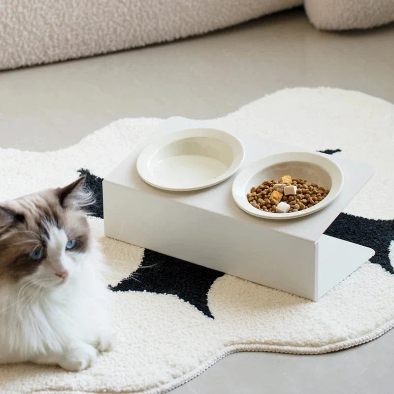 Stylish elevated ceramic pet bowls with an iron stand, designed for both cats and small dogs.