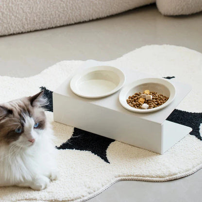 Stylish elevated ceramic pet bowls with an iron stand, designed for both cats and small dogs.